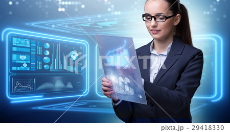 Businesswoman with tablet in data mining concept Businesswoman with tablet in data mining concept 29418330