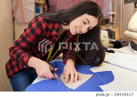 seamstress cutting fabric seamstress cutting fabric 29419317