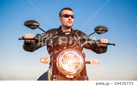 Biker on a motorcycle Biker on a motorcycle 29420755