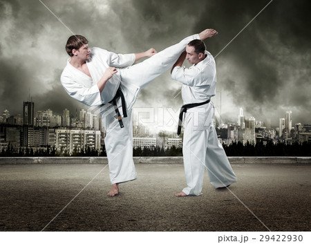 Karate fighters in action 29422930