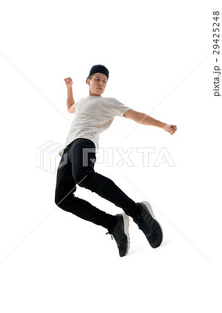 Hip Hop Dancer Performing On White Backgroundの写真素材