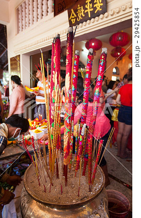 Offerings to gods in temple with aroma sticks Offerings to gods in temple with aroma sticks 29425854