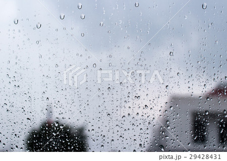 Drops of rain on the glass 29428431