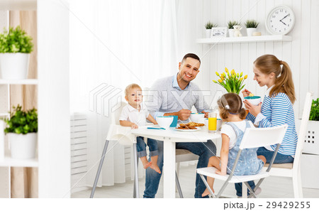 Happy family  at breakfast 29429255