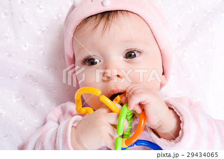 Baby with toy 29434065