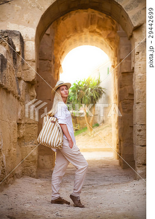Woman in Tunisia El Jem roman apmphitheatre Woman in Tunisia El Jem roman apmphitheatre 29442699