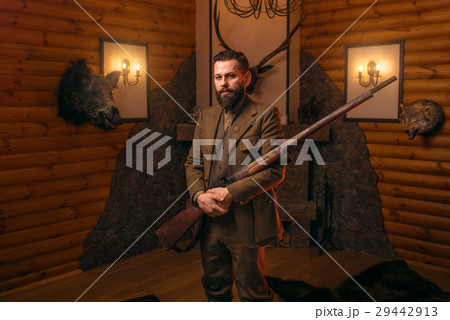 Vintage hunter man in traditional hunting clothing 29442913