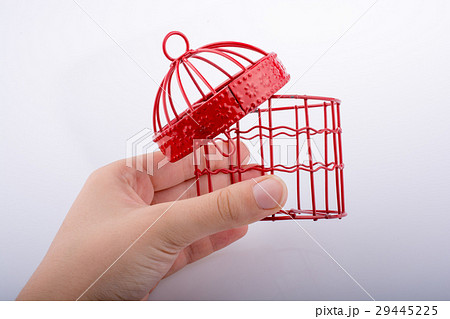 Little red color bird house with metal bars Little red color bird house with metal bars 29445225