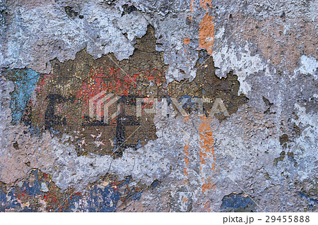 Facade of an old house with layers of old paint 29455888