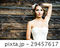 Beautiful Bride on Wooden Background 29457617