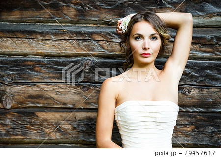 Beautiful Bride on Wooden Background 29457617