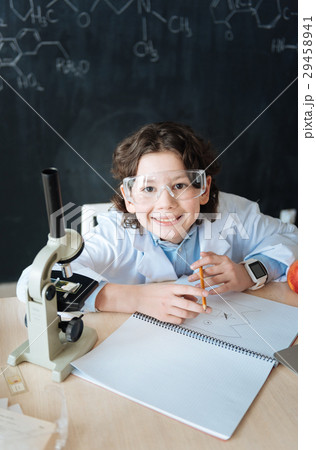 Smiling little scintist working on the Smiling little scintist working on the 29458941
