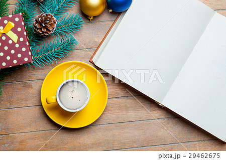 cup of coffee, opened notebook and decorations 29462675