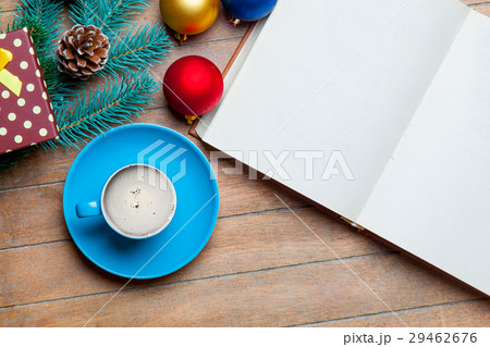 cup of coffee, opened notebook and decorations cup of coffee, opened notebook and decorations 29462676