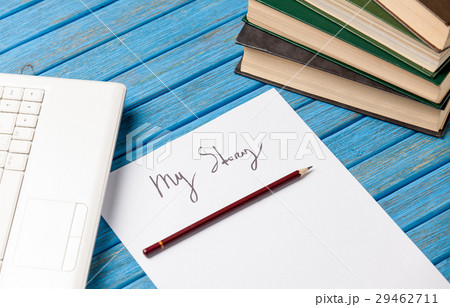 photo of pencil, books, laptop and paper 29462711