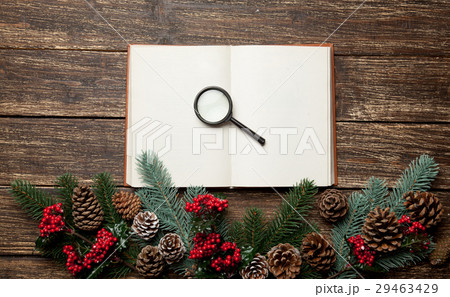 photo of opened notebook and magnifying glass photo of opened notebook and magnifying glass 29463429