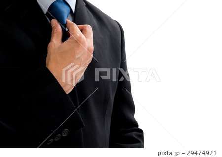 Businessman rearrange his tie 29474921