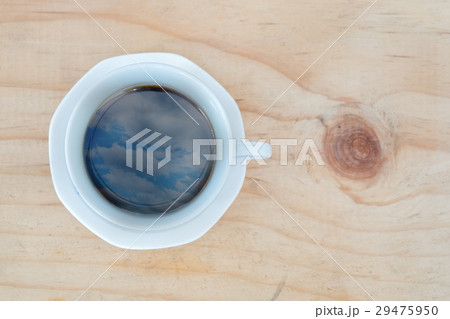 Cup of coffee and reflection of sky Cup of coffee and reflection of sky 29475950