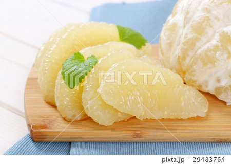peeled and sliced pomelo peeled and sliced pomelo 29483764