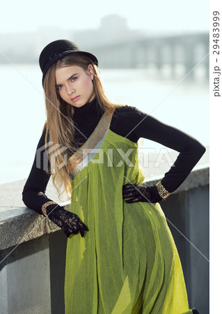 Fashion pretty young woman model in total black 29483999