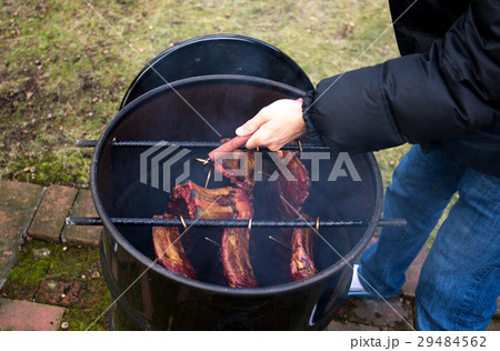 Man roasted barbecue smoke spare ribs 29484562