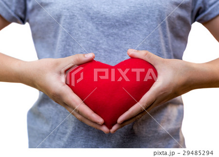 Woman holding heart shape isolated 29485294