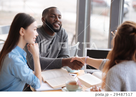 Three fellow students learning together 29487517