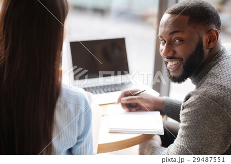 Young bearded guy holding his notebook Young bearded guy holding his notebook 29487551