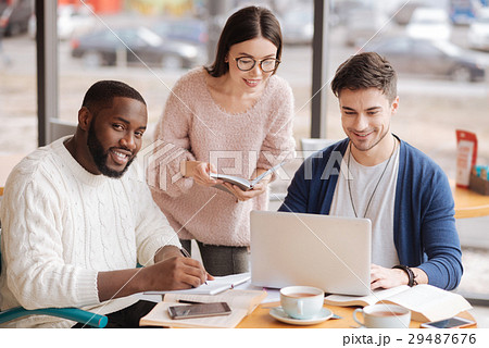 Group of young colleagues working together Group of young colleagues working together 29487676