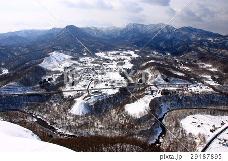八剣山から見る早春の豊平川と札幌岳 29487895