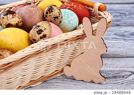 Easter basket and plywood rabbit. 29488048