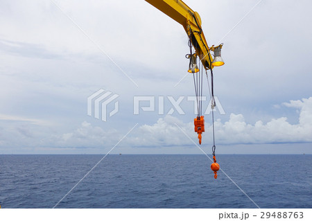 Crane boom and crane lighting in the sea Crane boom and crane lighting in the sea 29488763
