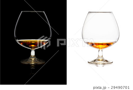 Glasses of whiskey over black and white isolated 29490701