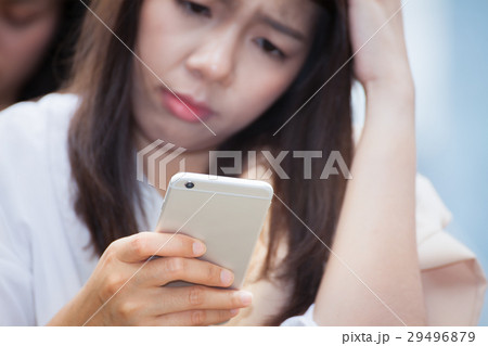 asian businesswoman using cell smart phone asian businesswoman using cell smart phone 29496879