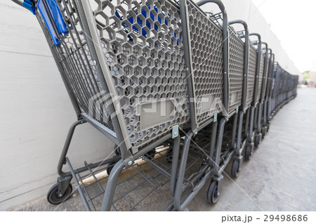 Shopping cart near Walmart supermarket 29498686