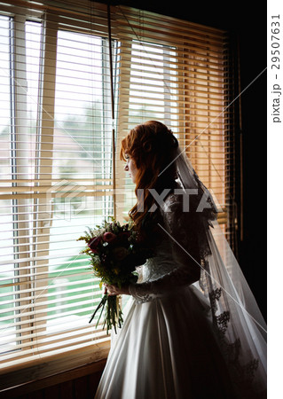 Beautiful bride with flower bouquet 29507631