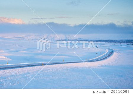 Snowy long road in Iceland 29510092