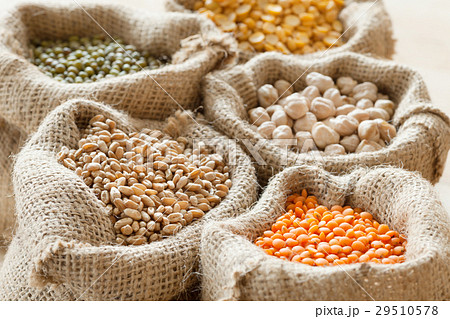 hessian bags of whole cereal grains close up 29510578