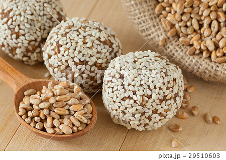 balls from ground wheat sprouts with sesame seeds balls from ground wheat sprouts with sesame seeds 29510603