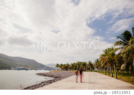 couple relax on beach together couple relax on beach together 29511951