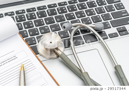 Stethoscope and prescription on laptop Stethoscope and prescription on laptop 29517344