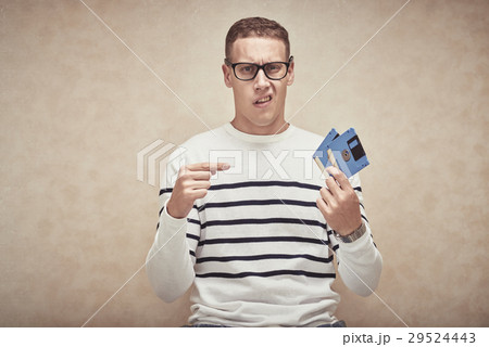 Man with floppy disk Man with floppy disk 29524443
