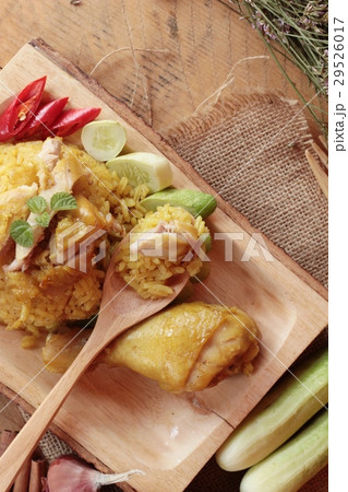 Chicken biryani with rice delicious and sauce Chicken biryani with rice delicious and sauce 29526017
