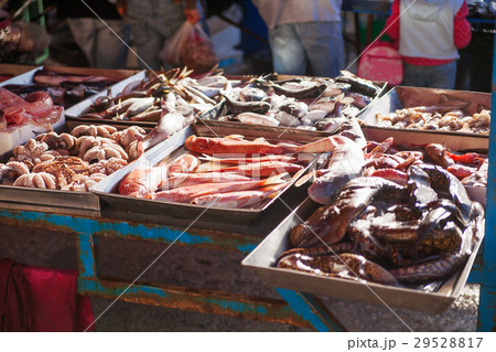 Boxes full of freshly caught mackerel and octopus. Boxes full of freshly caught mackerel and octopus. 29528817