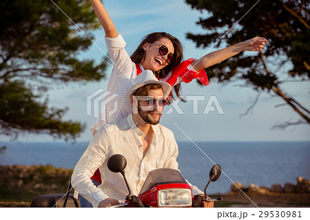 Couple in love riding a motorbike , Handsome guy 29530981