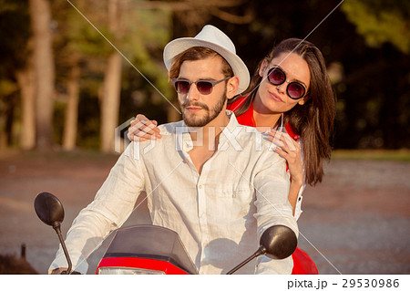 Couple in love riding a motorbike , Handsome guy 29530986