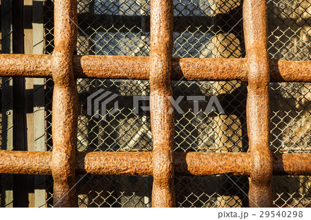 Close up iron bars or metal grating on window or Close up iron bars or metal grating on window or 29540298