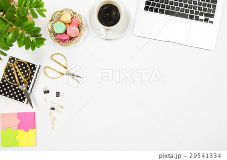 Feminine office desk workplace. Coffee cookies Feminine office desk workplace. Coffee cookies 29541334