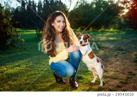 outdoor portrait of beautiful girl and the pet dog outdoor portrait of beautiful girl and the pet dog 29543010