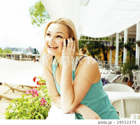 portrait of pretty modern girl friend in cafe open 29552275